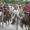 A group of people Salto La Jalda through a river.